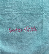 Minty green embroidered towels