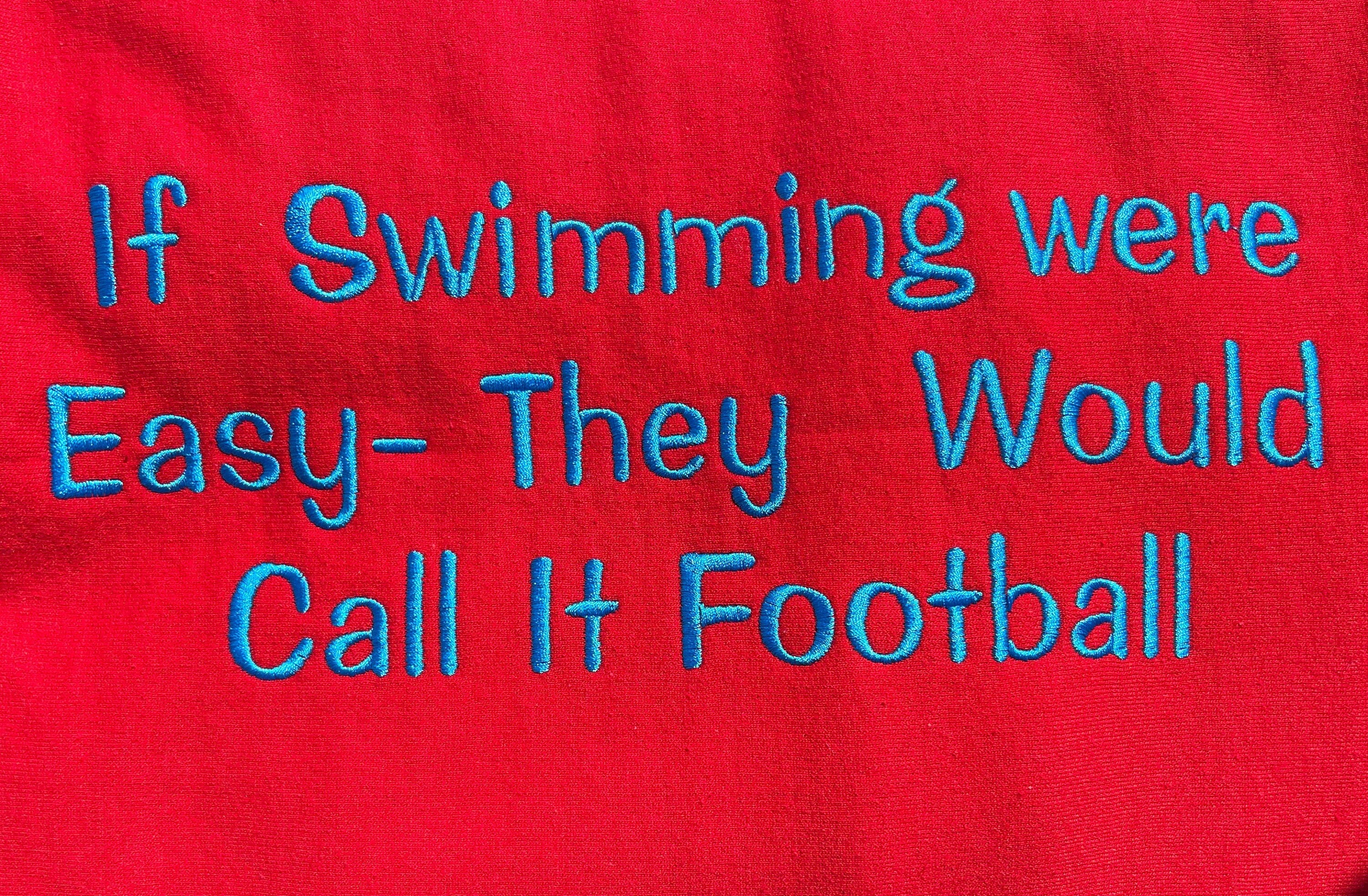 Red embroidered stadium blanket
