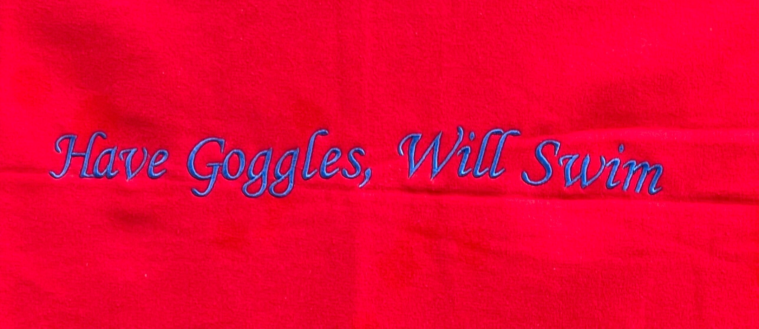 Red embroidered stadium blanket