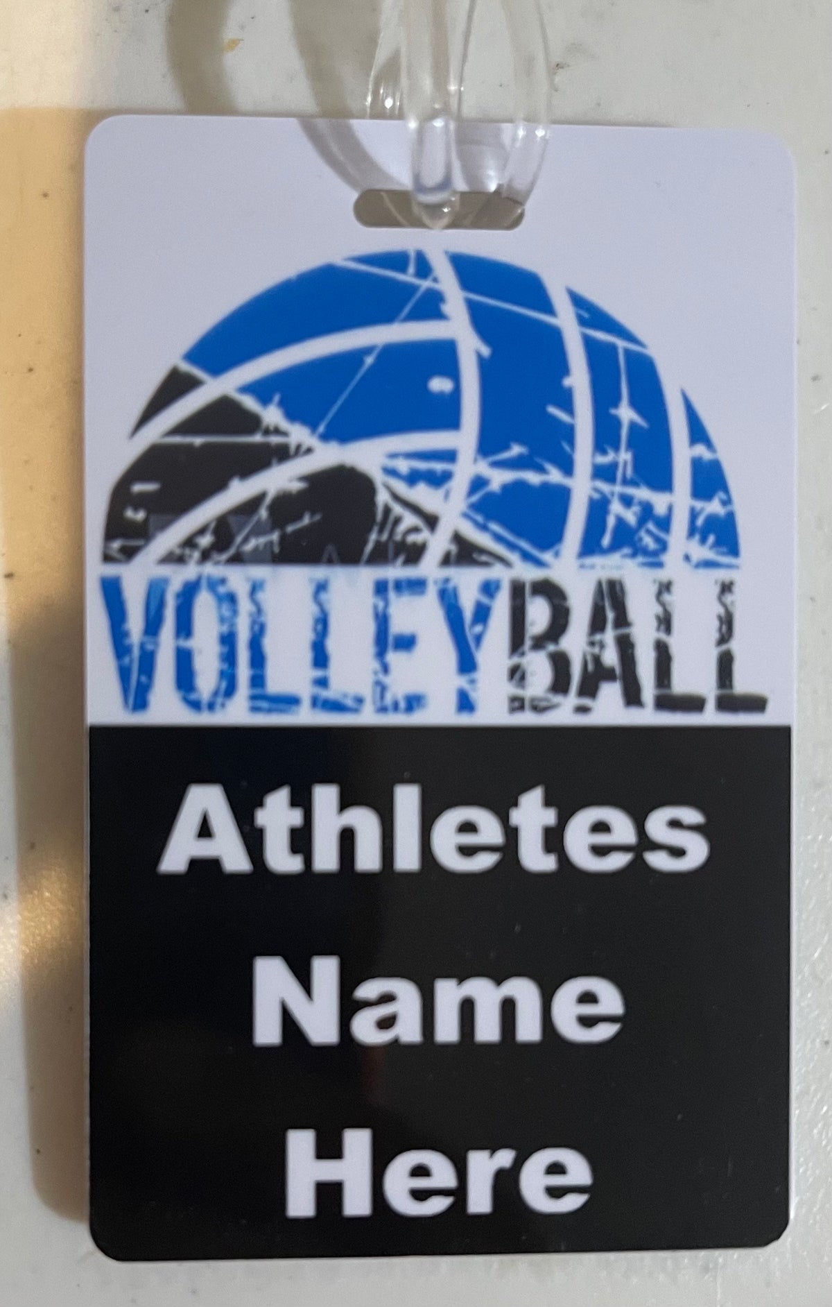 Volleyball blue black words and ball